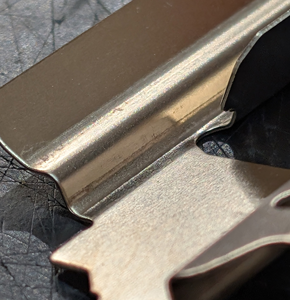 Photo of a caliper abutment shim