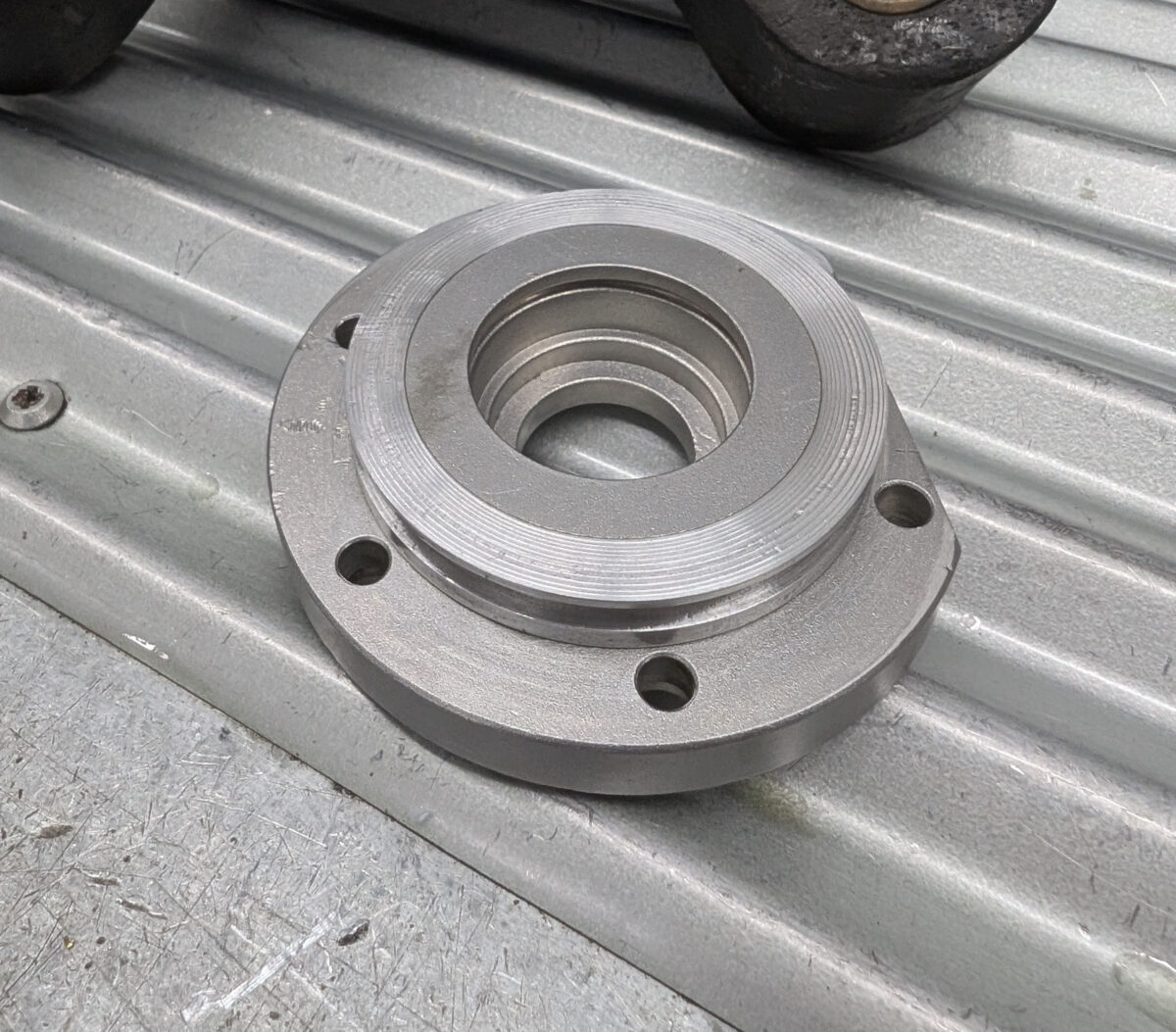 Photo of a back-plate with new O-Ring boss fitted